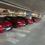 A fleet of Toyota Yaris cars ready for car rental pick-up