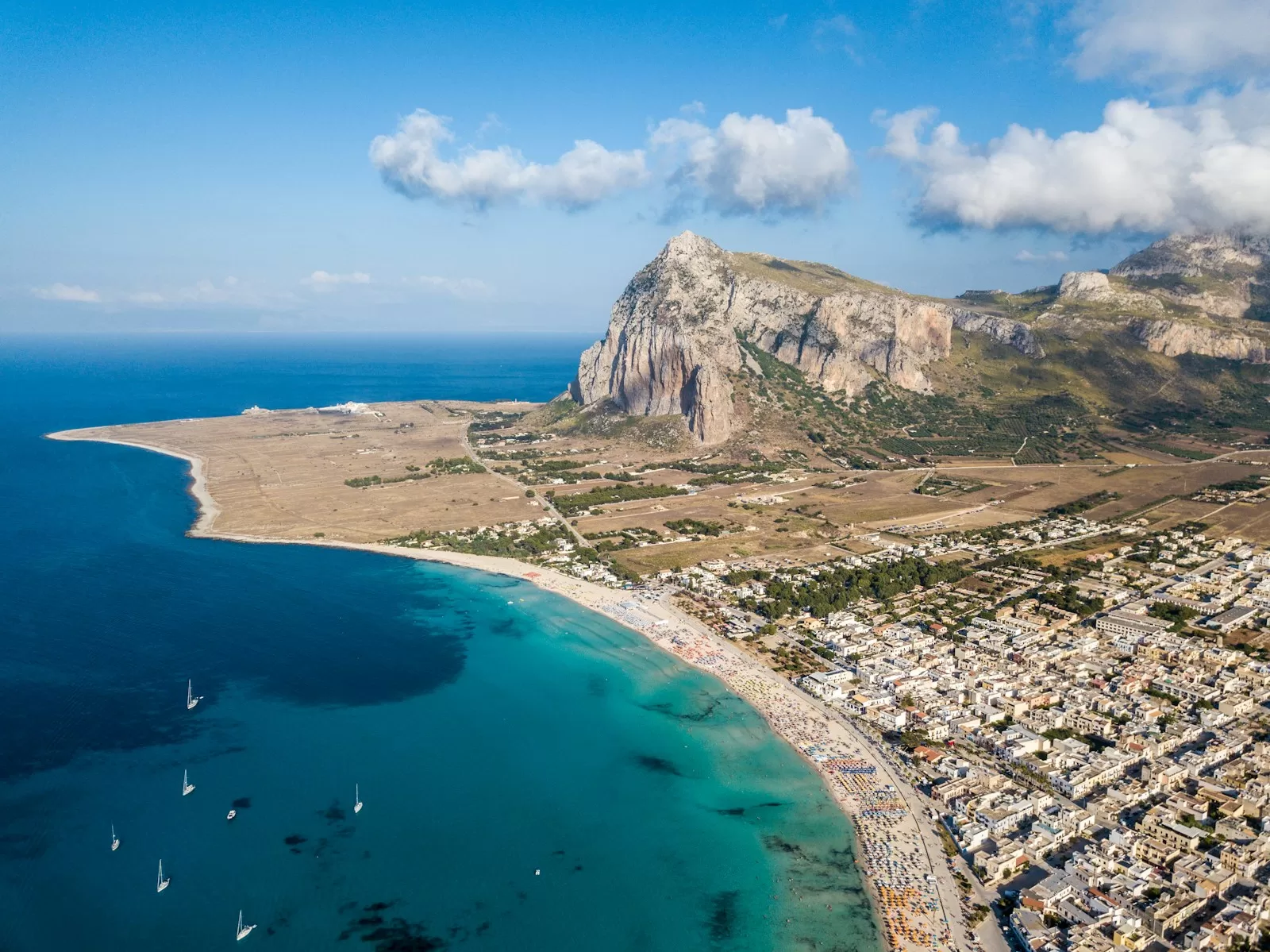 Car rental in Sicily: houses along the seashore from above