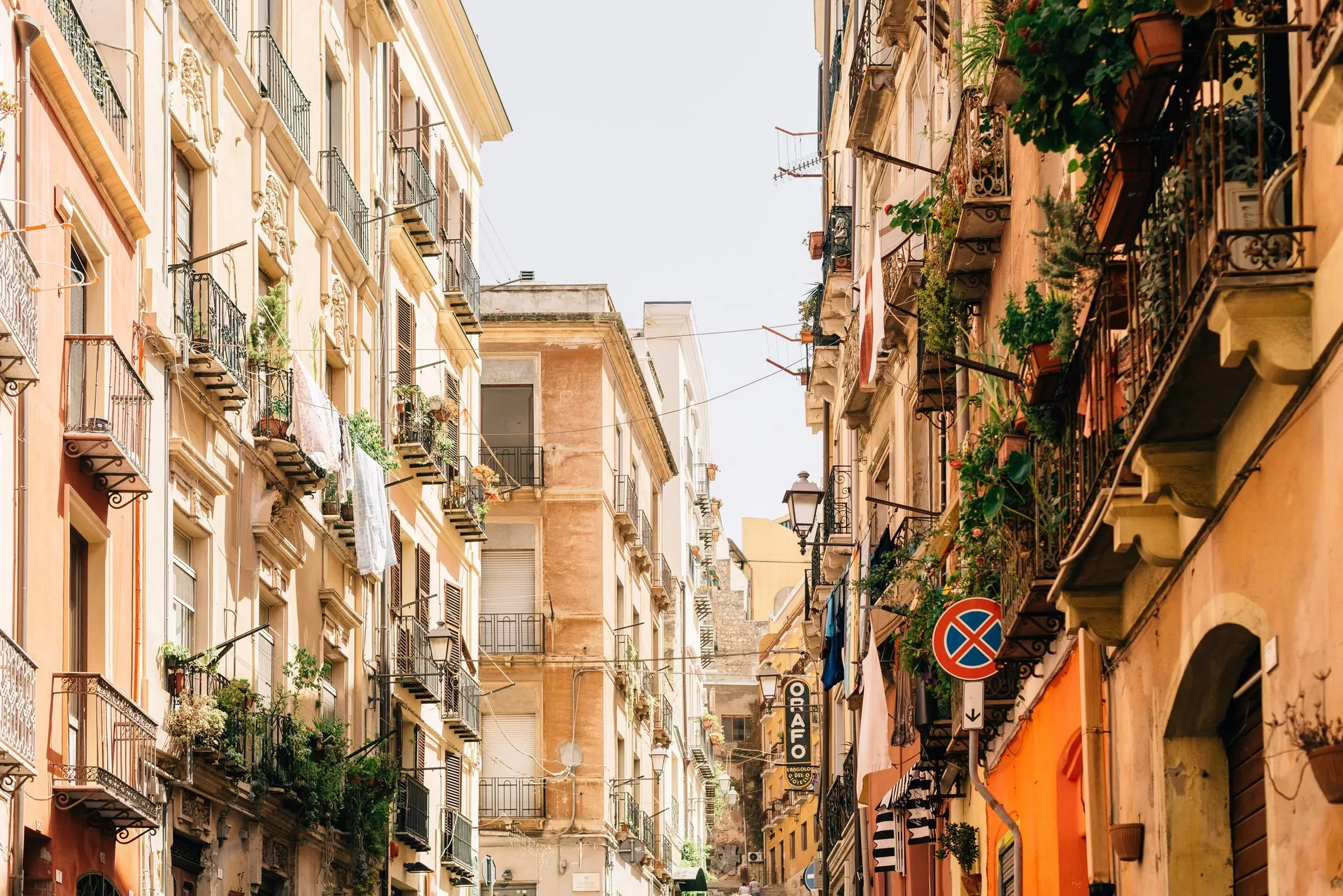 Narrow street with balconies in the historic centre of Cagliari, inside the camera-enforced ZTL zone