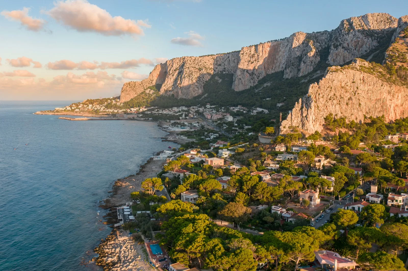 Green mountains meeting the sea on the Sicilian coast, the reward for driving out of Palermo