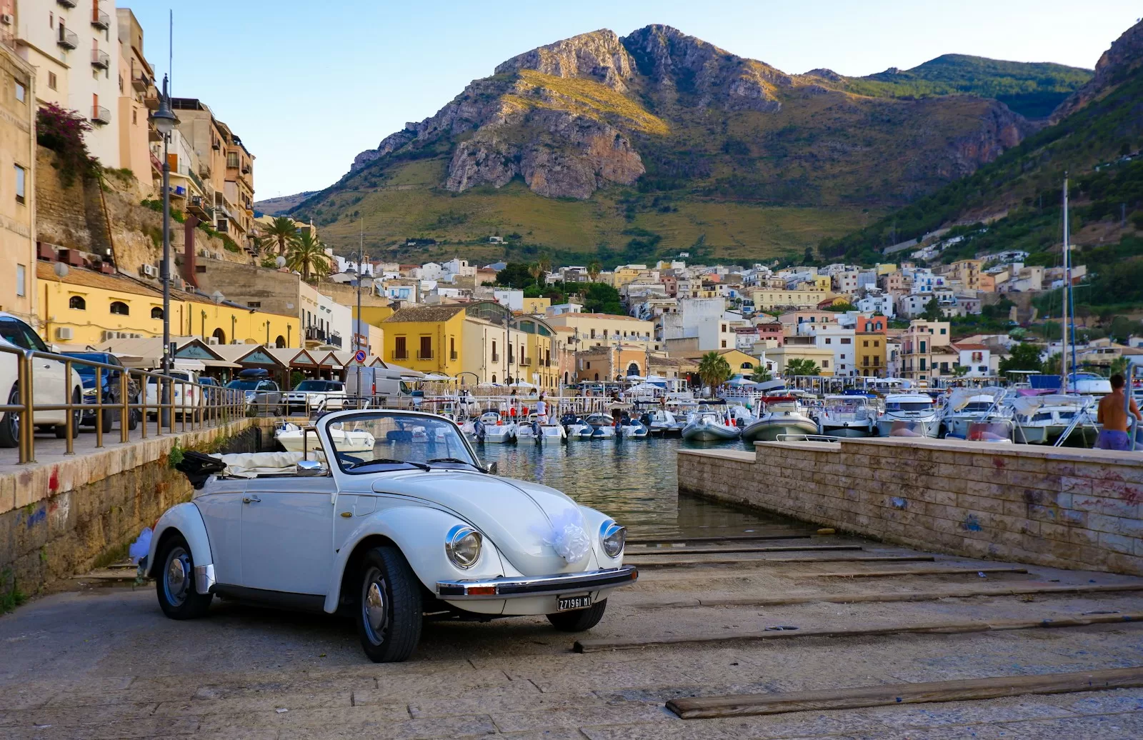Small car parked at the roadside, the right size for narrow Sicilian streets