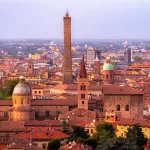 The towers and red roofs of Bologna, about 25 minutes by car from Bologna Airport