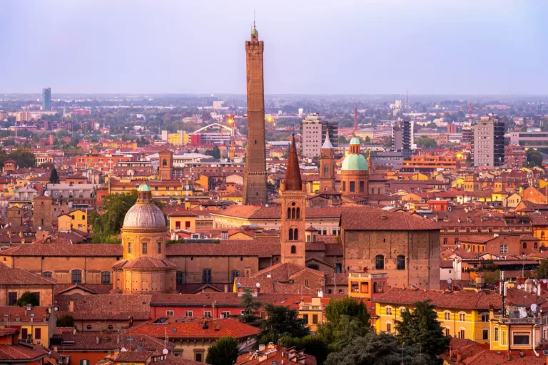 The towers and red roofs of Bologna, about 25 minutes by car from Bologna Airport