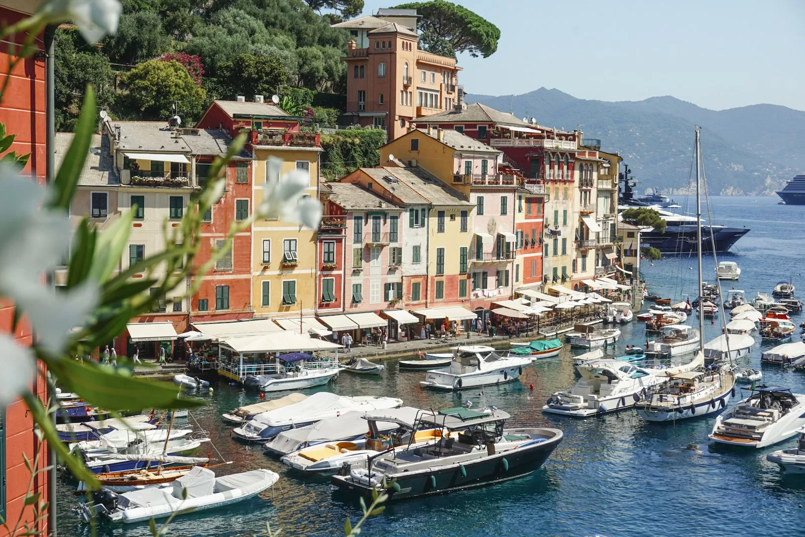 Portofino harbour with coloured houses and moored boats, about 48 minutes by car from Genoa Airport