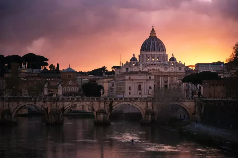 St Peter's Basilica above the Tiber in central Rome, which is about 34 minutes by car from Rome Fiumicino Airport