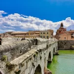 The Roman Tiberius Bridge over the Marecchia canal in Rimini, a short drive from Rimini Airport