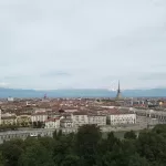 The Mole Antonelliana and the Alps above central Turin, which is about 28 minutes by car from Turin Airport